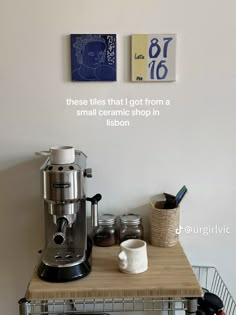 a coffee maker sitting on top of a wooden table