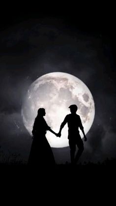 two people holding hands in front of a full moon with the silhouettes of them