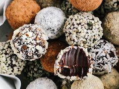 several different types of chocolate truffles in a bowl