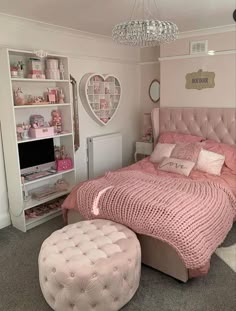 a bedroom with pink bedding and white furniture in the corner is decorated for valentine's day