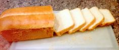 slices of bread sitting on top of a cutting board