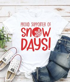 a t - shirt that says proud support of snow days on it, next to jeans and sneakers