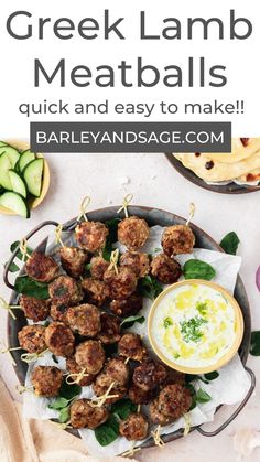 greek lamb meatballs on a plate with sauce and cucumbers in the background