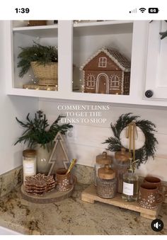 a kitchen counter with christmas decorations on it