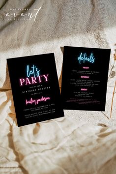 two party flyers sitting on top of a bed