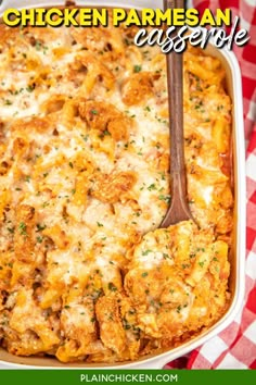 chicken parmesan casserole in a white dish with a serving spoon