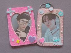 two small pink frames with pictures on them