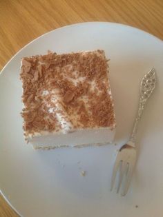 a piece of cake on a plate with a fork