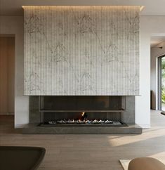 a large fireplace in the middle of a living room