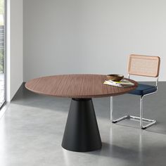 a round table with two chairs around it