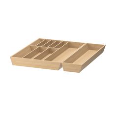 an empty wooden tray with compartments on it