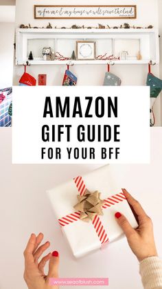 someone holding a present box with the words budget friendly gift guide for your bf