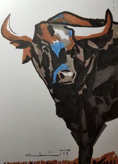 a painting of a bull is shown on the wall