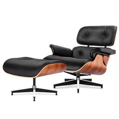 an eames lounge chair and ottoman in black leather