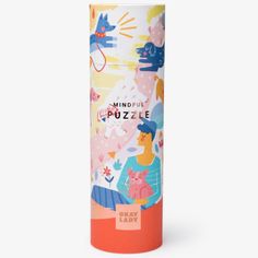 an orange and pink tube with the words mindful puzzle on it's side