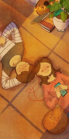 two people laying on the floor next to a potted plant and a cell phone