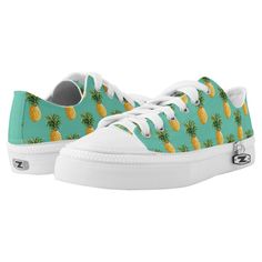 a pair of shoes with pineapples on them