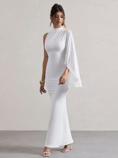 A statement piece for a special event, Half High Neck One Shoulder Long Sleeve Slim Fit Maxi Dress is the perfect maxi. This stunning dress is stretchy, slim and perfectly shows off your curves. It has detailed by a modest high neckline and flowing cape sleeve. Style yours with a tousled bun to complement its stunning neckline.Size: SIZE US EU BUST WAIST HIP LENGTH inch cm inch cm inch cm inch cm XS 6 34 27.5-31.5 70-80 22.0-25.9 56-66 30.7-34.6 78-88 54.33 138 S 8 36 29.1-33.0 74-84 23.6-27.5 60-70 32.2-36.2 82-92 55.12 140 M 10 38 30.7-34.6 78-88 25.2-29.1 64-74 33.8-37.8 86-96 55.91 142 L 12 40 33.0-37.0 84-94 27.5-31.5 70-80 36.2-40.1 92-102 56.69 144 *Note: The size is manual measurement, there may be 1-3cm error, this is not a quality problem.We have tried to restore the actual color Party Wear Maxi Dresses, Fitted Maxi Dress, Fall Winter Dresses, Maxi Dress Sale, Exclusive Dress, Dress Store, Hip Dress, Maxi Dress With Sleeves, Long Blouse