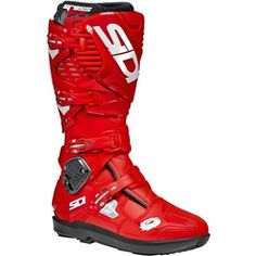 a pair of red motorcycle boots with black soles and white lettering on the side