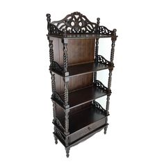 an ornate wooden shelf with four shelves