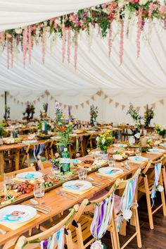 an image of a table set up with place settings for guests to eat and drink