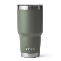 the yeti tumbler cup is shown in sage green and has a stainless steel lid