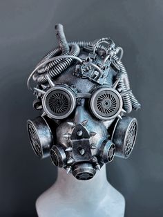 Conquer the realms of fantasy with our remarkable steampunk cosplay gas mask in silver. Dominating the mask are bold spikes and intricate tubes, exuding a commanding presence that's perfect for cosplay, parties, or conventions.


Age Group/Gender - Adult/Men

Size/Type - One size fits all adults

Mask Color - Silver

Mask Material - Polyresin

Accent Material - Paint Steampunk Mask, Silver Mask, Steampunk Cosplay, Type One, Gas Mask, Age Group, Mask, Paint, Silver