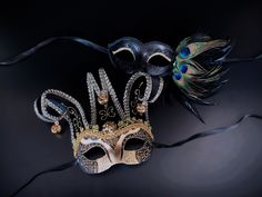 This couple's Masquerade Mask pairing complements any Mardi Gras themed attire. Gold, purple and green vibrant colors to complete your Mardi Gras look no matter what you wear!  I N C L U D E D Available as a couple's set.   Masks come with matching double sided satin ribbons attached. S H I P P I N G  -   Processed same day or within 24 hours.  1-2 day guaranteed delivery services offered, add items to cart and click on shipping tab for rates.  Pls leave a check out note with your need date & co Mardi Gras Masks And Prosthetics, Black Masquerade Mask For Festivals, Black Masquerade Mask For Festivals And Costume Party, Black Masquerade Mask For Carnival, Black Masks And Prosthetics For Carnival Festivals, Black Masks For Masquerade Festivals, Black Masquerade Mask For Party Festivals, Black Masquerade Mask For Party And Festivals, Couples Masquerade Masks