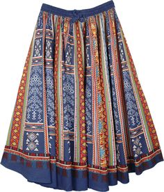 A full, voluminous pure cotton printed skirt with a lot of fabric for a distinctly feminine silhouette.  This beautiful circular skirt in cobalt blue color made from wide printed cotton fabric is an exquisite piece of clothing. #tlb #MaxiSkirt #Peasant #Dance #Printed #JuniorPetite #cottonskirt #printedsummerskirt #fullyflaredcircularskirt Blue Cotton Tiered Dress, Blue Voluminous Gathered Skirt, Blue Cotton Full Skirt, Blue Cotton Tiered Skirt, Blue Bohemian Skirted Dress, Blue Bohemian Gathered Maxi Skirt, Bohemian Blue Skirted Dress, Blue Flared Dress With Gathered Skirt, Traditional Gathered Cotton Skirt