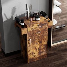 an old wooden cabinet with some hair products on it and a mirror in the background