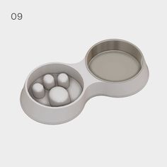 an object that looks like it has four balls in it