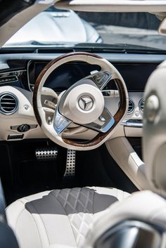 the interior of a modern car is clean and ready to be driven