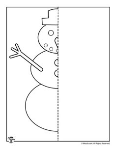 a snowman peeking out from behind a blank sheet to be cut out into the shape