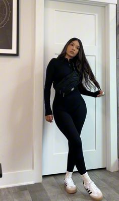 Long sleeve mockneck zipper jumpsuit, work out ootd, athlesiure wear, crew socks, adidas sambae, adidas crossbody fanny pack #outfitinspo #athlesuire #workoutfitswomen #pilatesoutfits #oufitideas #style #casualwomensfashion #blackoutfit Adidas Samba Fall Outfit, Fall Samba Outfit, Crew Sock Outfits, Sambae W Outfit, Outfit With Samba Adidas, Crossbody Fanny Pack Outfit, Black Jumpsuit Outfit Winter, Outfits With Samba Adidas