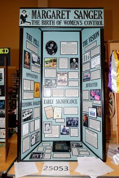 a display case with pictures and information about women's rights