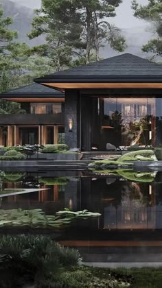 the house is surrounded by water lilies and pine trees, with its reflection in the pond