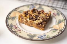 two pieces of chocolate chip bars on a plate