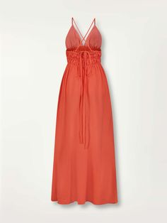 The Kelemi Coral Collection features linen tencel silhouettes in a bright, happy, and sophisticated coral color that flatters all skin tones. This elevated take on the classic sundress features a deep V neckline, elastic ruching at the waist, and a fluid, breezy, long skirt. It also includes adjustable straps that can be worn as a cross-back or a halter. Made in Kenya, this silhouette is made of a soft, opaque blend of sustainable linen and tencel that reduces the wrinkle tendency of 100% linen. Classic Sundress, Coral Collection, Gameday Fits, Triangle Dress, Muslin Dress, Tencel Fabric, Color Analysis, Classic Outfits, Inspiration Style