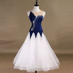 a white and blue dress on a mannequin