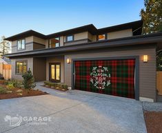 a house with a tartan garage cover on the front door and side walk leading up to it