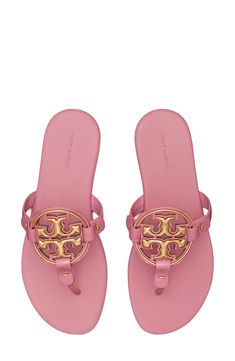 Known for its supple leather and iconic branding, this flip-flop takes it up a notch with a memory foam–cushioned footbed and metal logo hardware. Flat sole Memory foam cushioning Leather upper and lining/rubber sole Imported Hawaii Shoes, Light Pink Sandals, Sandals Glitter, Sandals Women, It Girl Shoes, Coach Pink Flat Sandals, Pink Coach Sandals, Luxury Pink Flat Sandals, Tory Burch Miller Sandals