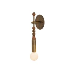 an old fashioned wall light with a white ball hanging from it's arm and two arms