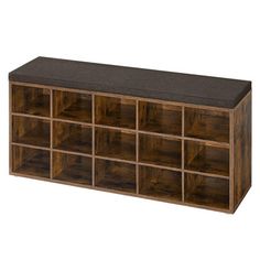 a large wooden shelf with many compartments