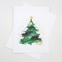 Christmas Card set featuring a watercolor style abstract Christmas tree. - Set of 8 matching white cards and envelopes, blank inside. - A2 size, 4.25" x 5.5" folded (1/4 of 8.5x11 sheet size)  - Printed on white medium weight smooth finish card stock. - Packaged in a resealable clear plastic envelope. - Please note that colors may be slightly different than how they appear on your monitor. - From a pet-free, smoke-free home. - My shop name appears in small print on the back of the cards. Save mo Aquarell Christmas, Christmas Cards Watercolor, Watercolor Christmas Trees, Minimalist Holiday Cards, Watercolor Notecards, Abstract Christmas Tree, Watercolor Holiday Cards, Watercolor Holiday, Plastic Envelope