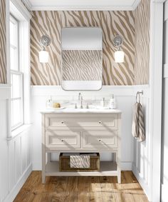 a bathroom with zebra print wallpaper and wooden flooring, two mirrors above the sink