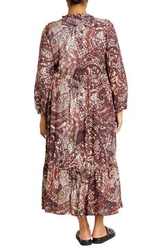 Add some elegance to your next dinner-date look in this flowy, tiered maxi dress that's trimmed with dainty ruffles and covered in a beautiful boho-inspired print. 52" length Slips on over head V-neck Long sleeves with elastic cuffs Unlined 100% viscose Machine wash, line dry Imported Safari Dress, Sheer Maxi Dress, A Line Maxi Dress, Long Sleeved Dress, Short Sleeve Maxi Dresses, Maxi Shirt Dress, Sleeved Dress, Khaki Dress, Tiered Maxi Dress