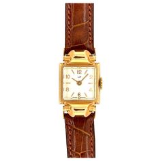 This women's wristwatch from LIP embodies a timeless retro charm. With its sculpted rectangular yellow gold case, it combines elegance and sophistication. The case has a smooth finish that enhances the classic design of the watch. The square white dial brings a fresh and modern touch to this retro watch. It is designed with meticulous attention to detail, featuring clear and legible hour and minute numerals. The brown leather strap adds a touch of warmth and sophistication to the ensemble. It is Retro Watches, Brown Leather Strap, Gold Case, Women Wrist Watch, White Dial, Retro Stil, Style Retro, High Quality Leather, Womens Watches