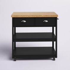 a small black table with two drawers on one side and an open drawer on the other