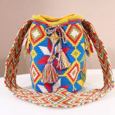 Wayuu Mochila Multicolor Handmade Colombian Large Size Boho Bucket Bag Purse This Bag Is Stylish And Chic; The Perfect Size For All Your Essentials. This Crocheted Bucket Bag Can Go With Your Favorite Jeans And A T-Shirt. 100% Handmade Crochet Bucket Bag Multicolor (Blue, Yellow, Green, Coral And White) Drawstring Closure Size: Large 11” High X 9” Diameter. 21” Strap Drop Brand New Without Tag Crochet Bucket Bag, Crochet Bucket, Large Shoulder Bags, Favorite Jeans, Handmade Crochet, Blue Yellow, Yellow White, Bucket Bag, Large Size