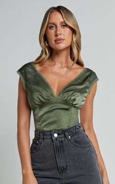 Get ready to turn heads in the Gloria Top - V Neck Lace Detail Cap Sleeve Top In Sage. This stunning green top is perfect for any occasion, whether you're dressing up or keeping it casual. The plunging v-neck and lace detailing add a touch of femininity, while the cap sleeves provide a flattering silhouette. Made from satin and polyester, this top is both comfortable and stylish. Pair it with your favorite jeans for a standard look or dress it up with a skirt for something more formal. With its Tops For Pear Shaped Women, Showpo Outfits, Green Satin Top, Sage Green Top, Basic Black Dress, Neon Outfits, Bachelorette Dress, Spring Maxi Dress, Navy Bridesmaid Dresses